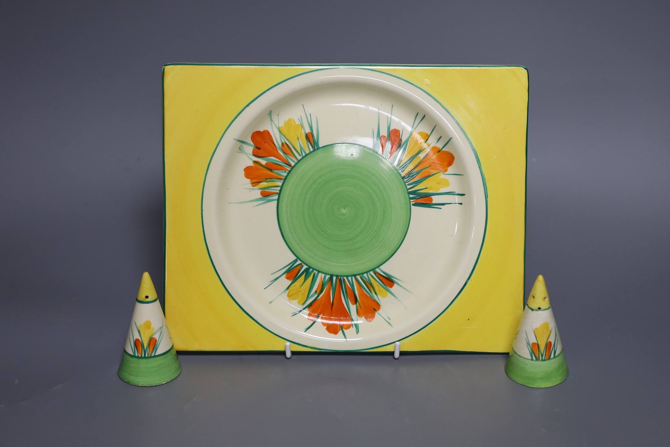 Clarice Cliff Sungleam Crocus, salt and pepper pots. trencher plate, plate 26.5 cms wide